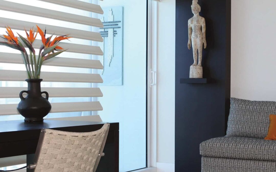 Pirouette® Sheer Shades from Hunter Douglas filtering light in a suburban home